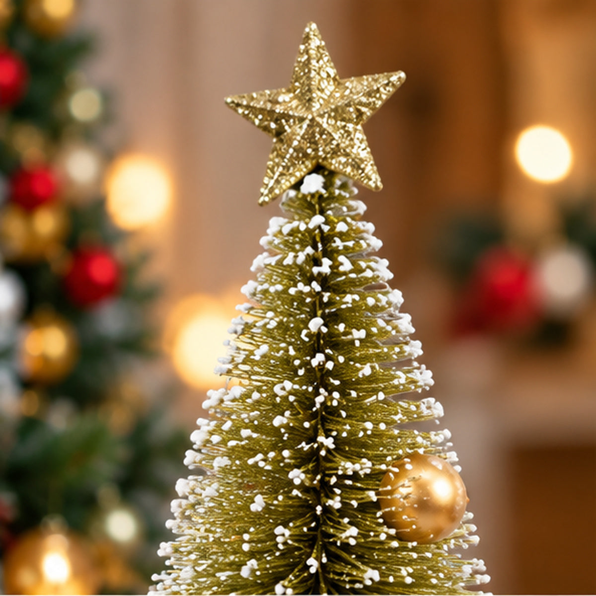 Gold Snow-Frosted Bottle Brush Mini Christmas Tree with Star Topper – gold star topper and snowy bristles closeup