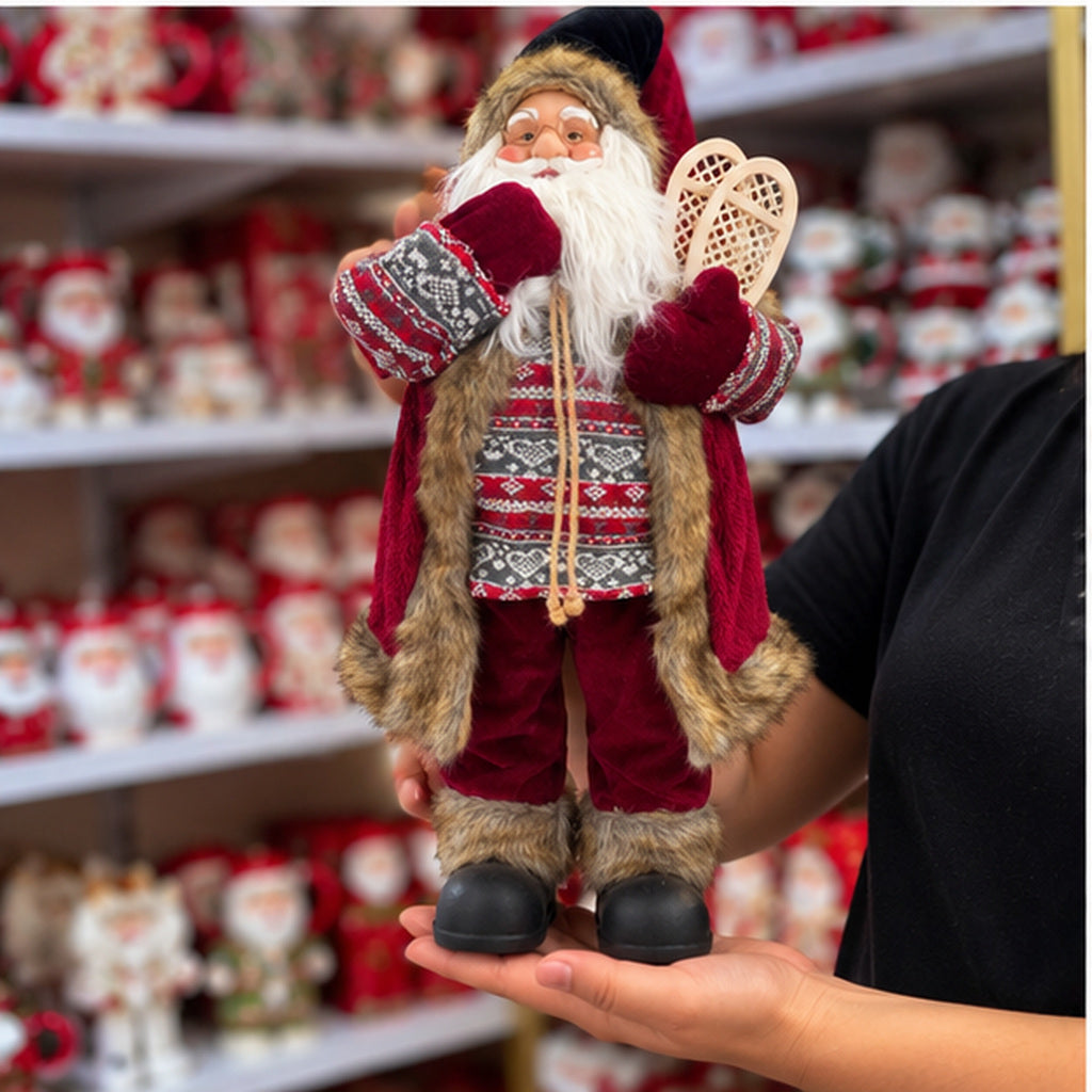 Nordic Alpine Santa Claus Christmas Figurine with Snowshoes & Knitted Sweater – handheld display view