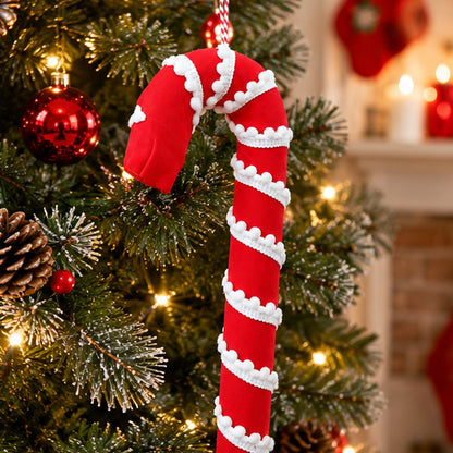 Plush Red Candy Cane Christmas Tree Hanging Ornament with Pom-Pom Trim – hanging on Christmas tree bough