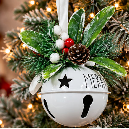 White Metal Jingle Bell Christmas Ornament with "MERRY" & Frosted Greenery – hanging on Christmas tree branch